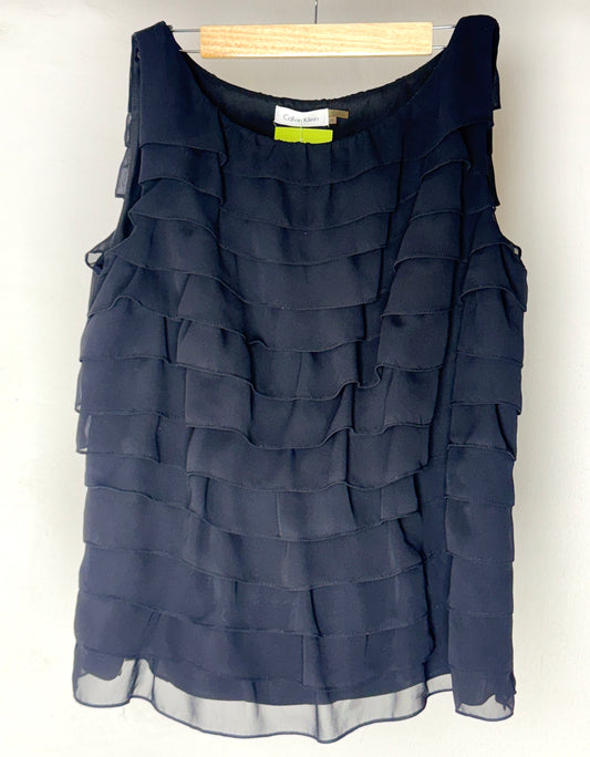 Blusa negra capas
